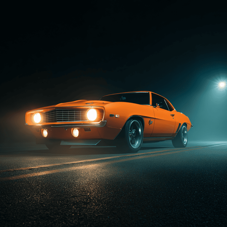 A ghostly orange Camaro on a dark highway, representing the 1971 Uniondale “Ghost Camaro” sightings.