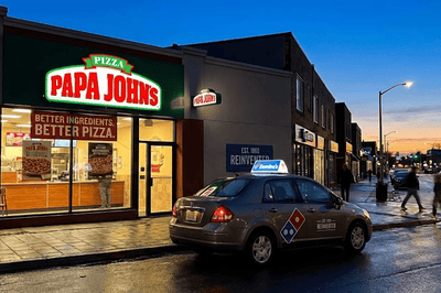 Domino’s and Papa John’s delivery imagery positioned together, symbolizing their long running battle for leadership in the pizza industry.