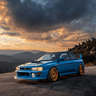 Subaru 22B widebody rally-bred car parked in scenic mountain setting