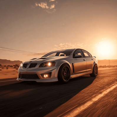 Pontiac G8 GXP driving on an open road, representing the cult-classic status of Pontiac’s final sedan.