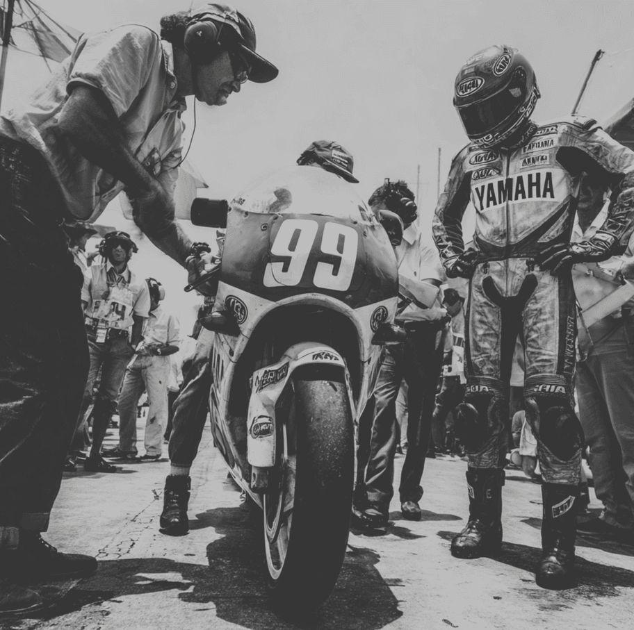 1992 Yamaha YZR500 Grand Prix race bike in the paddock, representing the unpredictable machine that still won the championship.
