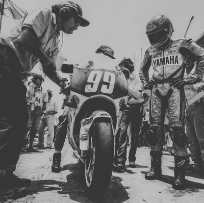 1992 Yamaha YZR500 Grand Prix race bike in the paddock, representing the unpredictable machine that still won the championship.