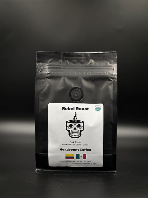 A bag of Rebel Roast coffee with a dark roast label, featuring a white skull logo and the text 'Headcount Coffee', indicating the brand.