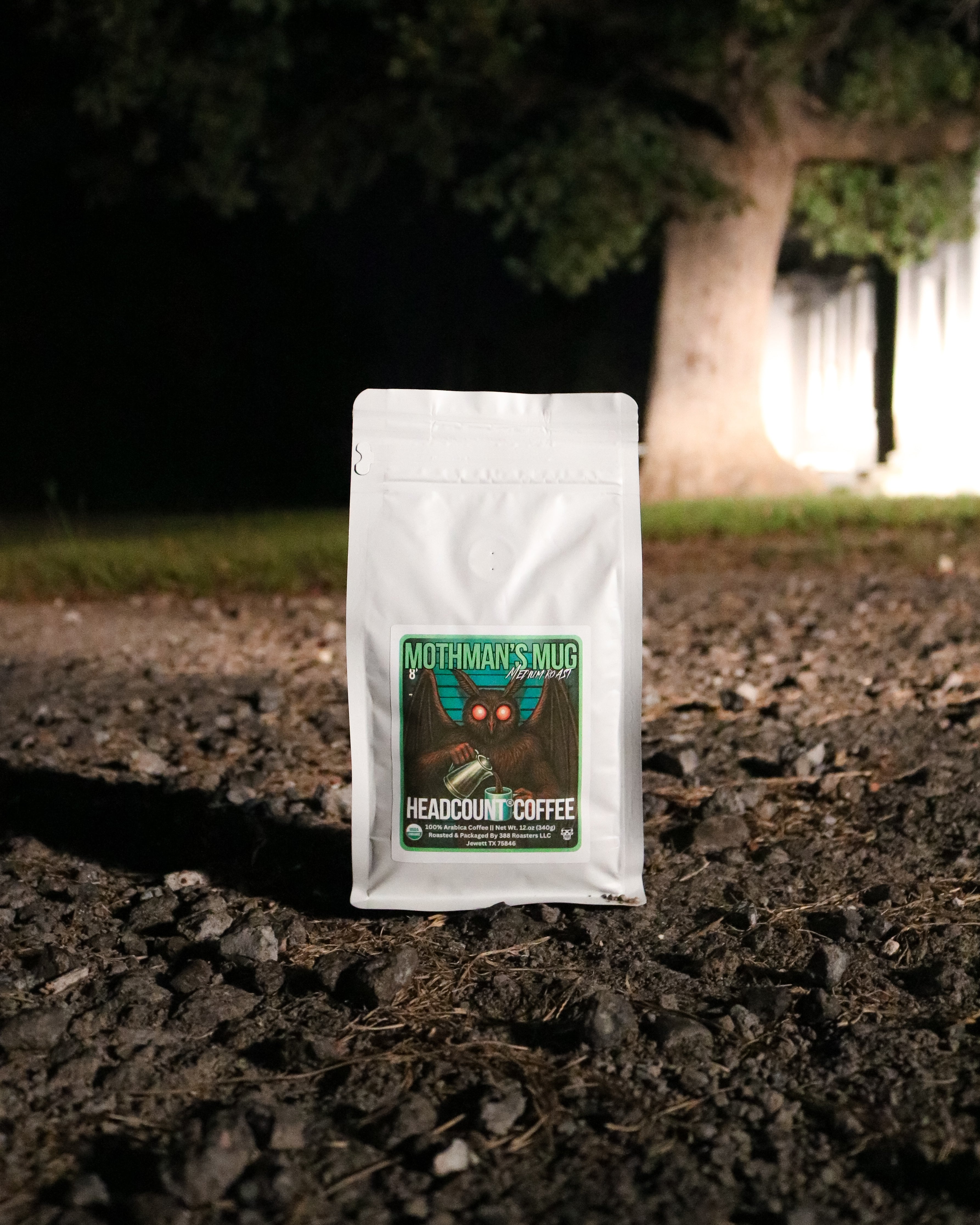 Headcount Coffee Mothman’s Mug medium roast organic coffee bag from Texas coffee roastery at night.